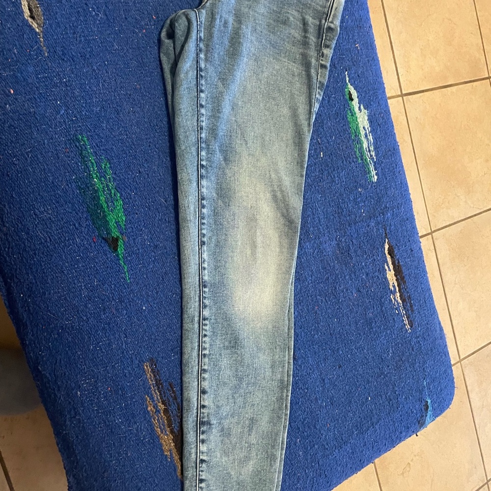 Light Blue Skinny Jeans with Distressed Design